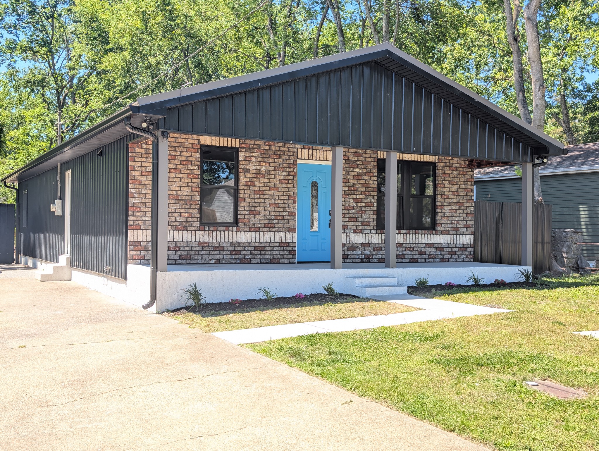 244 Warrior Road Madison, TN 37115 - Photo 1 of 24 a view of a house with swimming pool in front of it