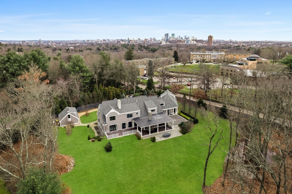 75 Goddard Avenue Brookline, MA 02445 - Photo 26 of 27 a view of a garden with houses