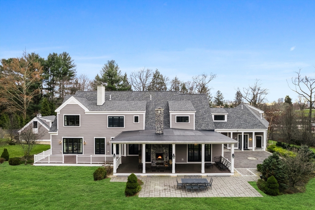 75 Goddard Avenue Brookline, MA 02445 - Photo 27 of 27 front view of a house with a yard