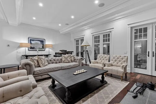 a living room with furniture and a table