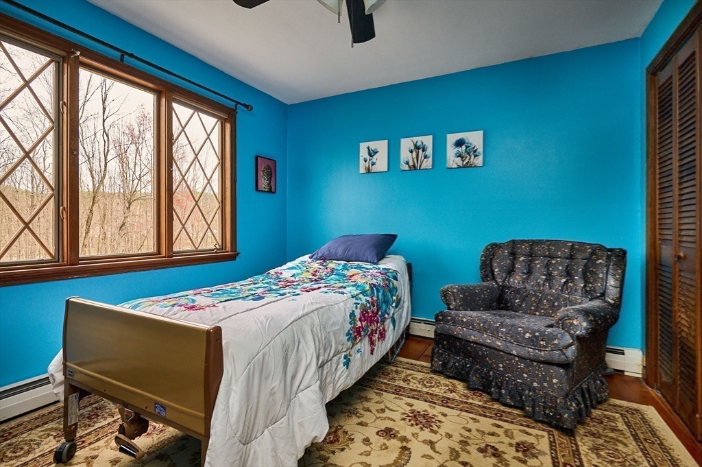 14 East Hawley Road Charlemont, MA 01339 - Photo 23 of 42 a bedroom with a bed and a window