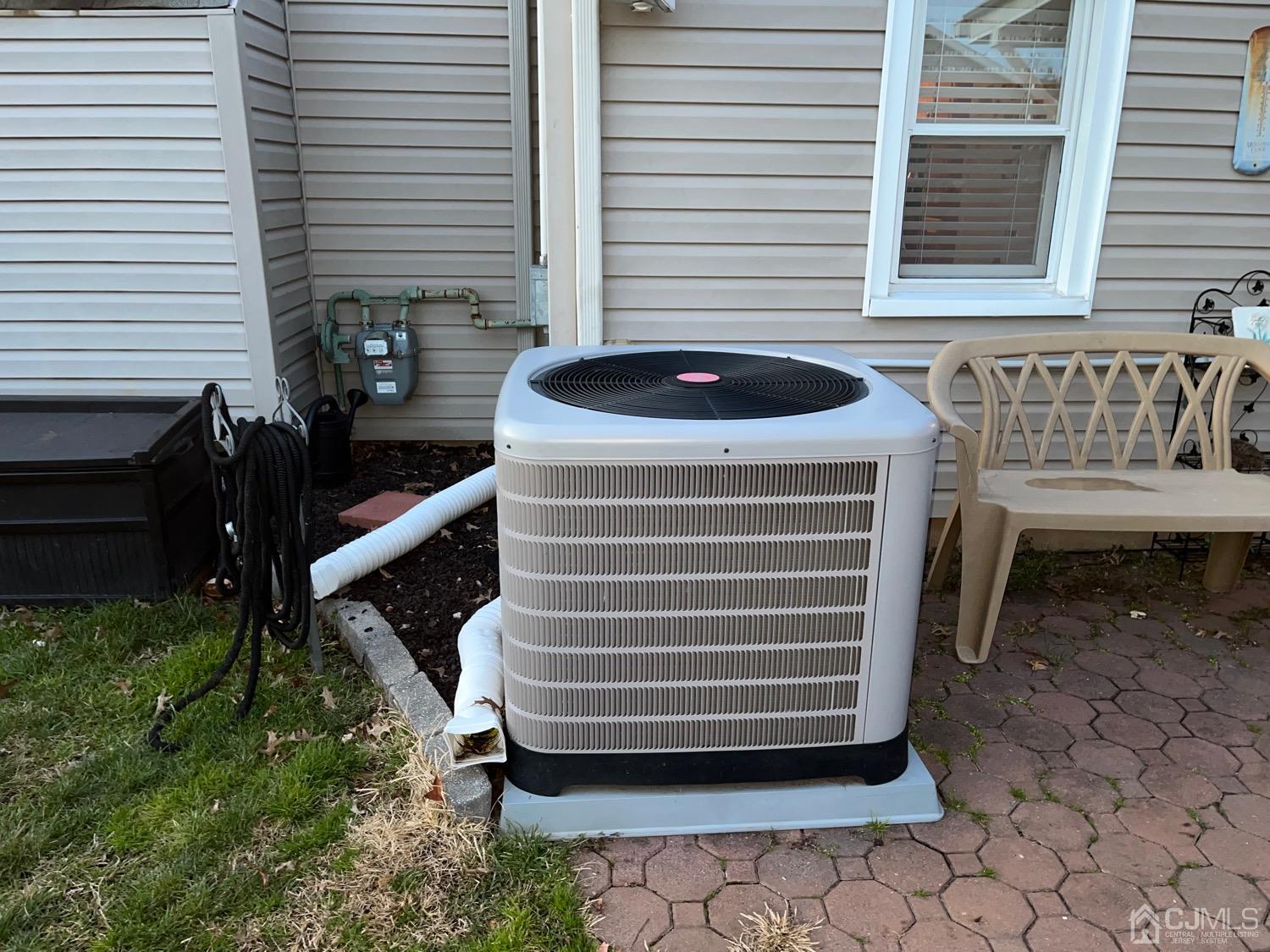 34 Dalton Place Edison, NJ 08817 - Photo 15 of 20 a couple of chairs sitting in backyard of house