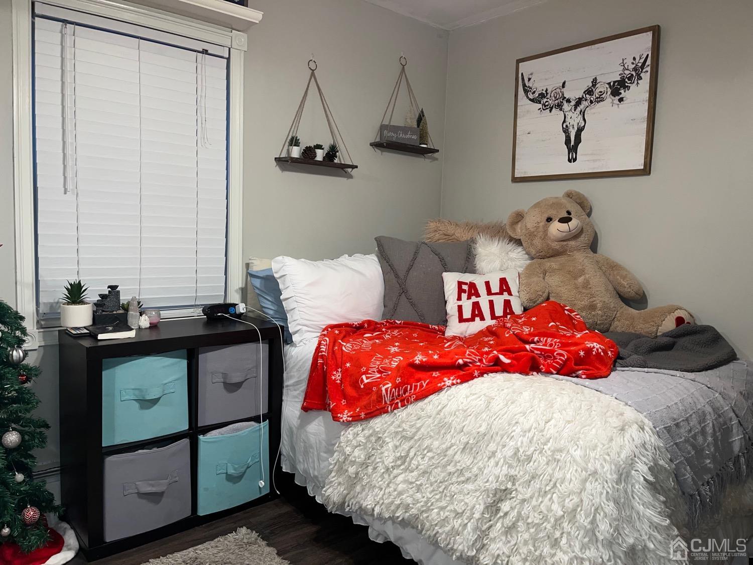34 Dalton Place Edison, NJ 08817 - Photo 19 of 20 a bedroom with a bed and wooden floor
