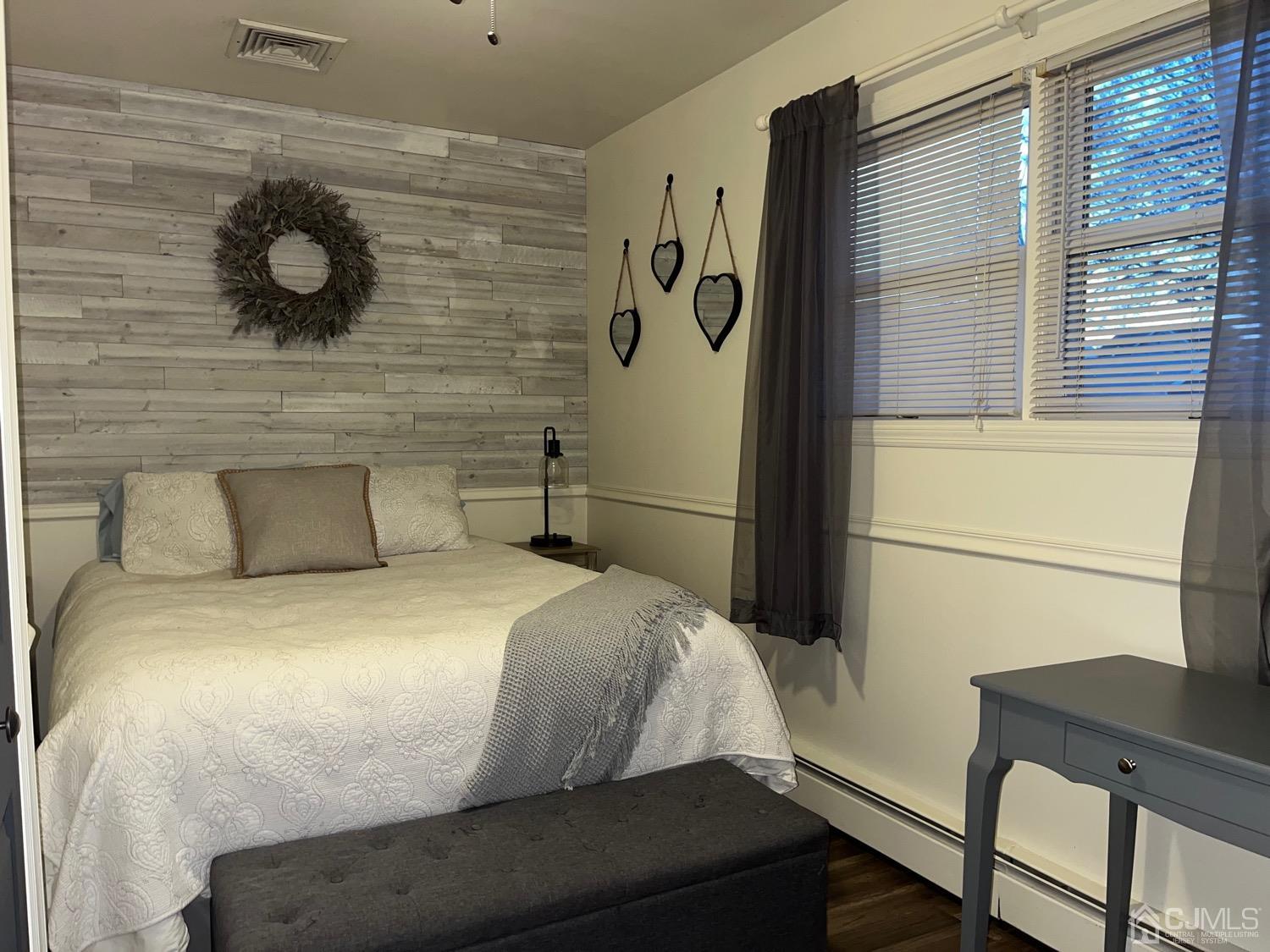 34 Dalton Place Edison, NJ 08817 - Photo 8 of 20 a bedroom with a bed and a dresser