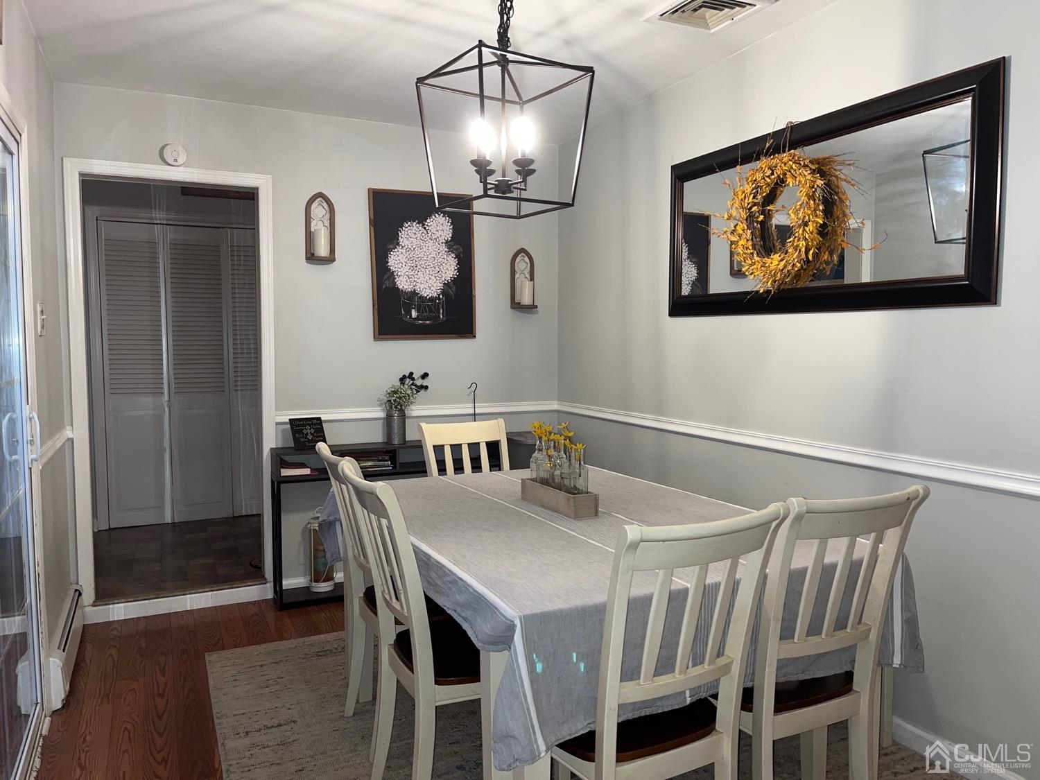34 Dalton Place Edison, NJ 08817 - Photo 9 of 20 a view of a dining room with furniture wooden floor and a chandelier