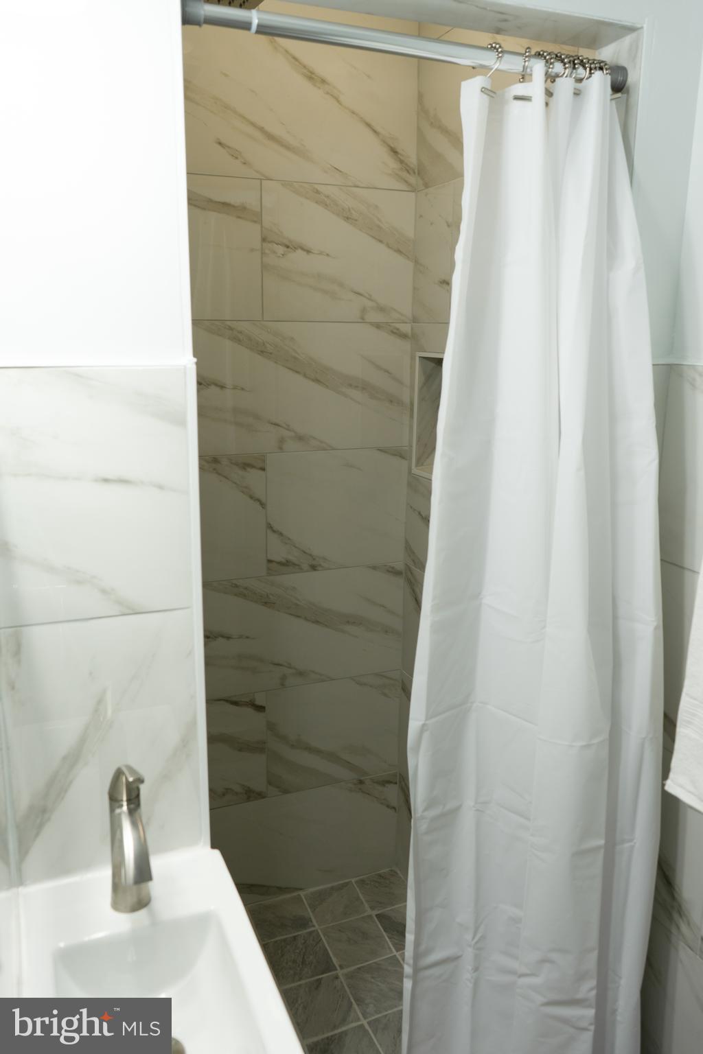 7329 12th Street Northwest Washington, DC 20012 - Photo 18 of 20 a bathroom with a shower