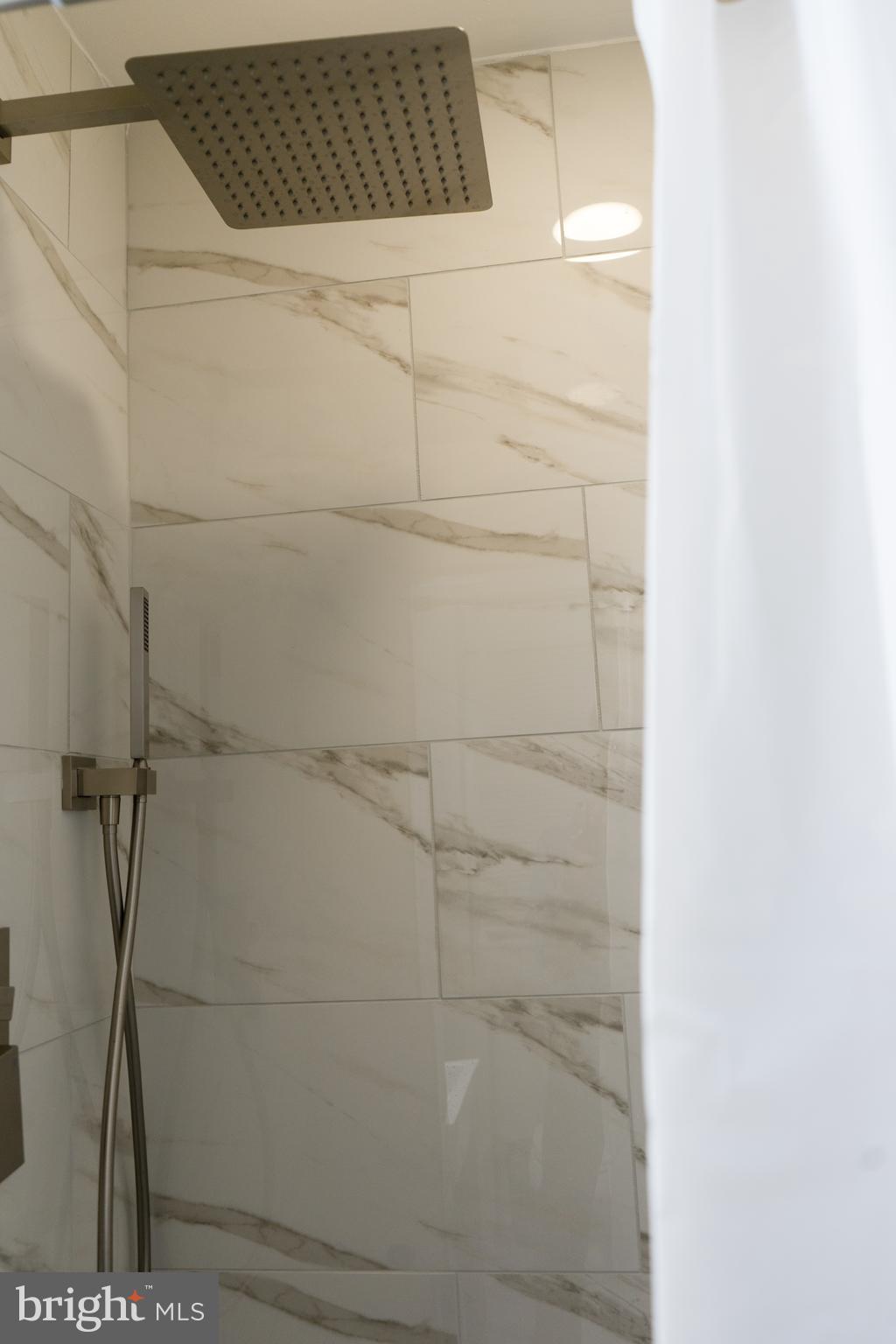 7329 12th Street Northwest Washington, DC 20012 - Photo 19 of 20 a bathroom with a shower