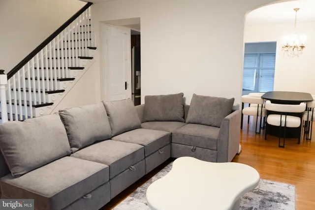 a kitchen with stainless steel appliances a stove microwave and refrigerator
