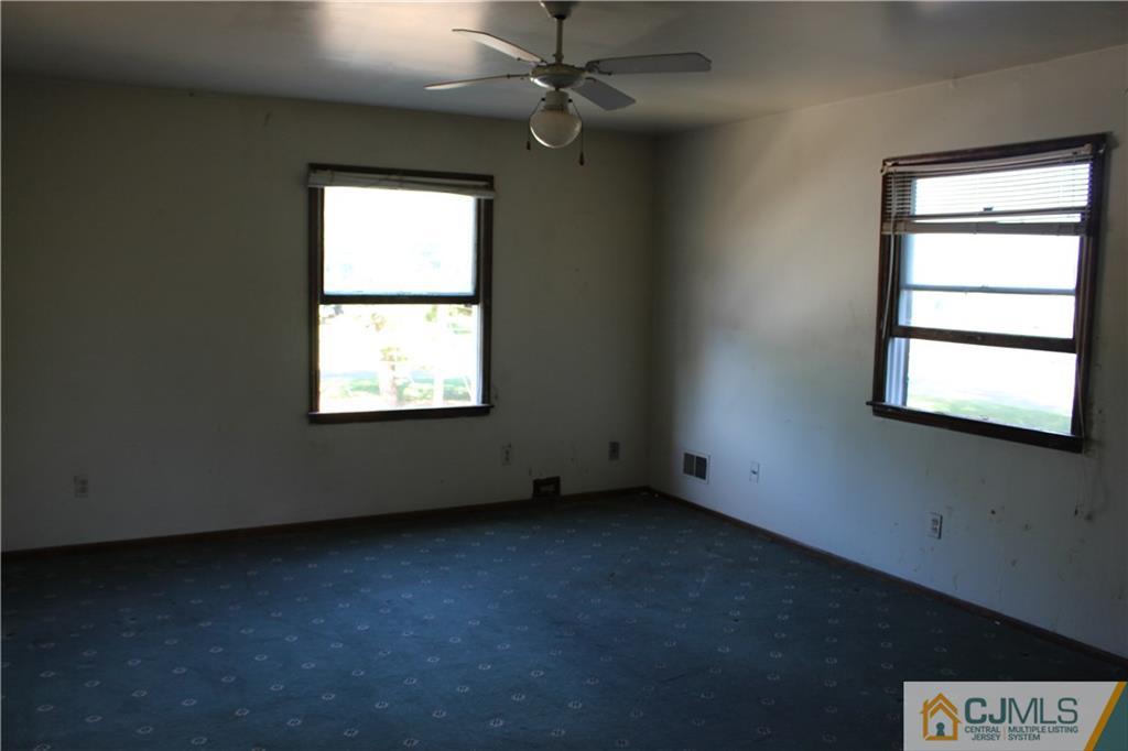 317 Ridge Road Dayton, NJ 08810 - Photo 12 of 16 an empty room with a window