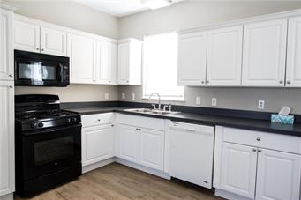344 Bushkill Street, Unit 2 Easton, PA 18042 - Photo 19 of 30 A well-appointed kitchen offers ample cabinetry and modern appliances for culinary pursuits.