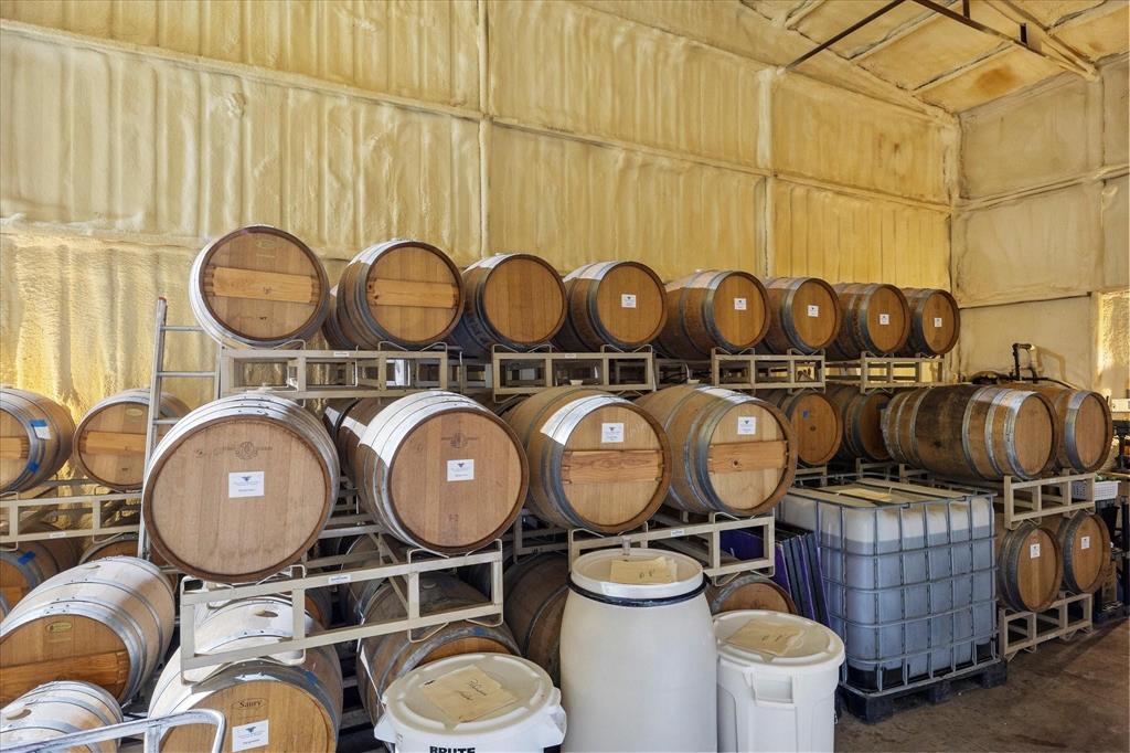 3399 Peterson Road South Iowa Park, TX 76367 - Photo 19 of 40 a kitchen with stainless steel appliances a stove and a white cabinets
