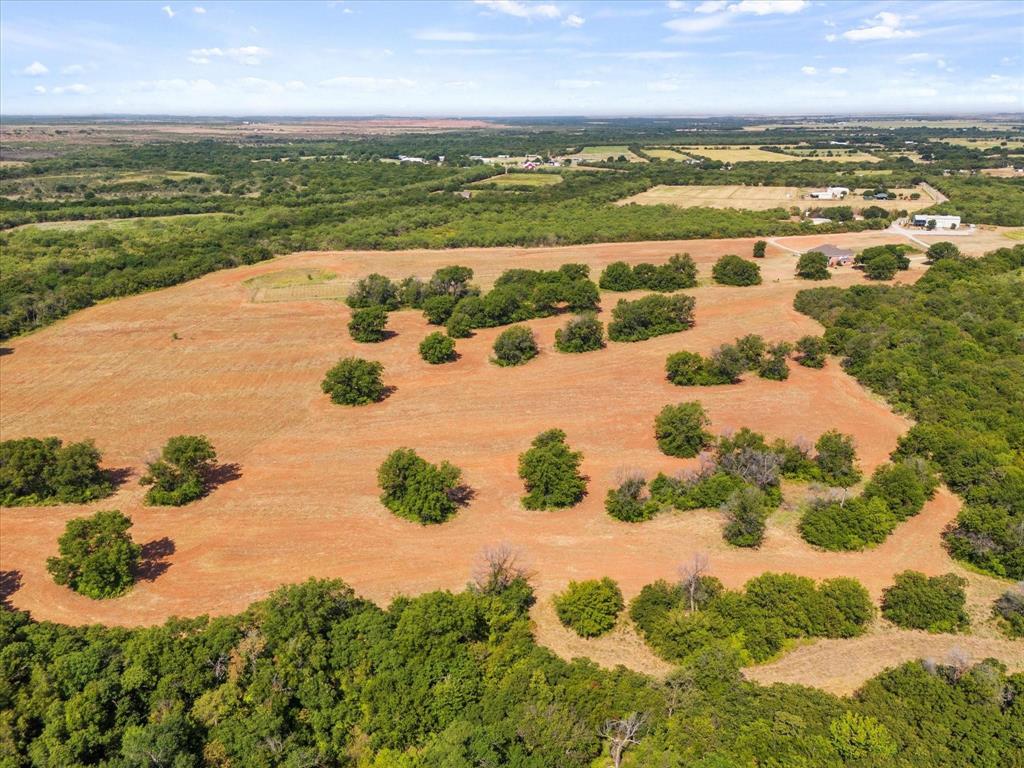 3399 Peterson Road South Iowa Park, TX 76367 - Photo 20 of 40 a view of a lake with a beach