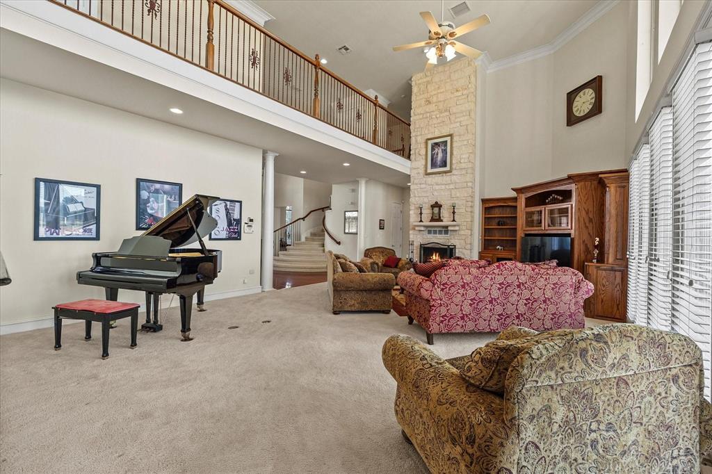 3399 Peterson Road South Iowa Park, TX 76367 - Photo 24 of 40 a living room with furniture and a piano