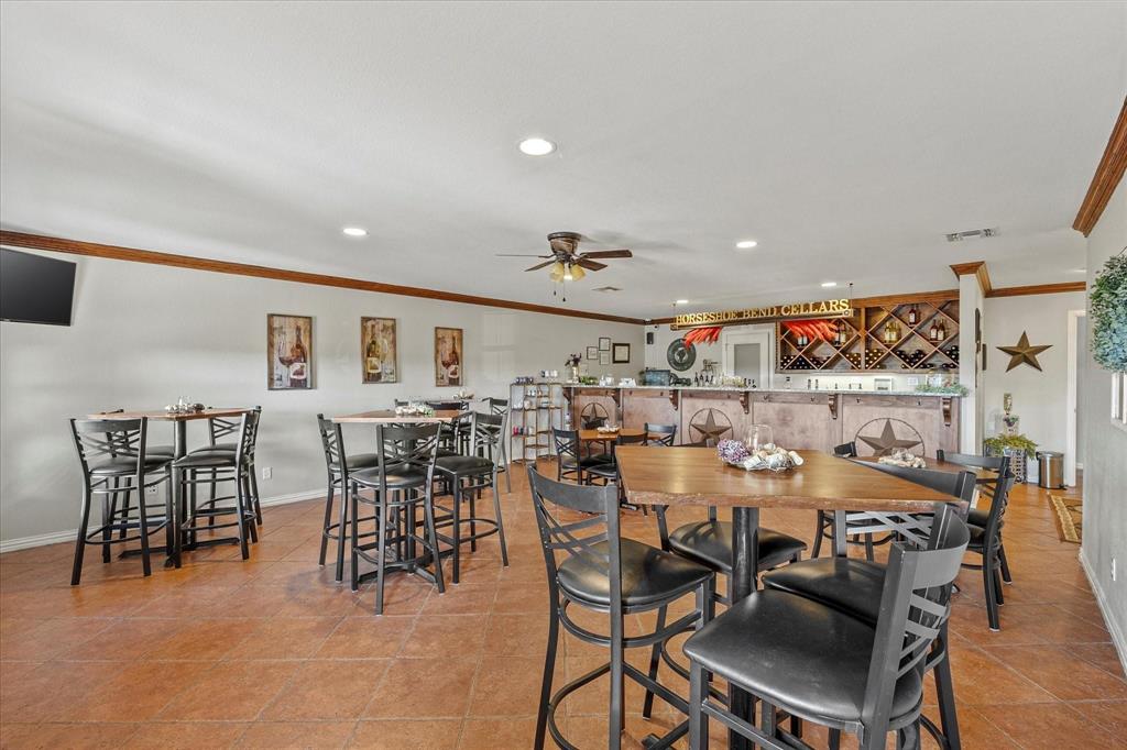 3399 Peterson Road South Iowa Park, TX 76367 - Photo 8 of 40 a view of a dining area with furniture
