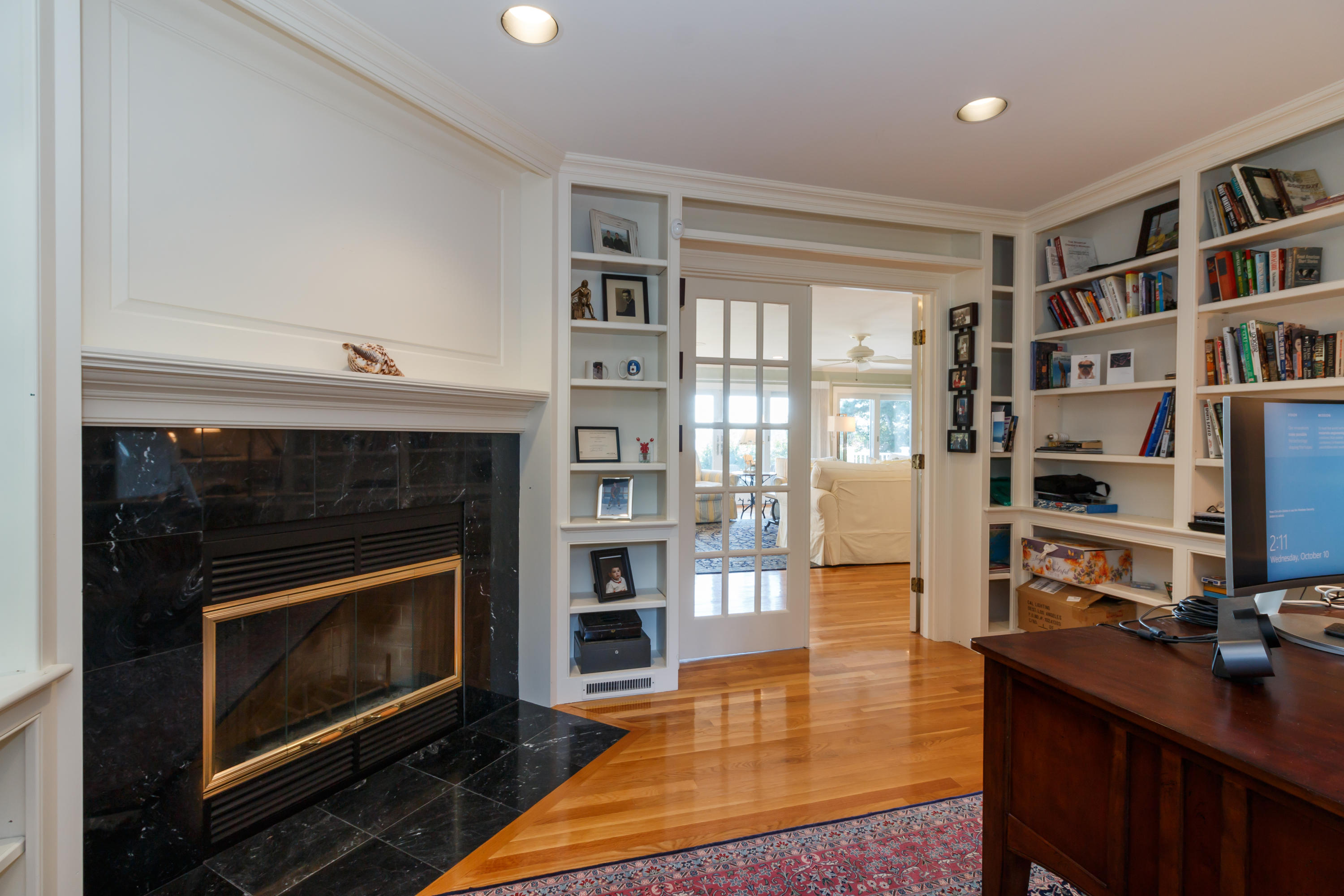 56 Lakeview Drive Centerville, MA 02632 - Photo 11 of 30 a living room with furniture and a fireplace