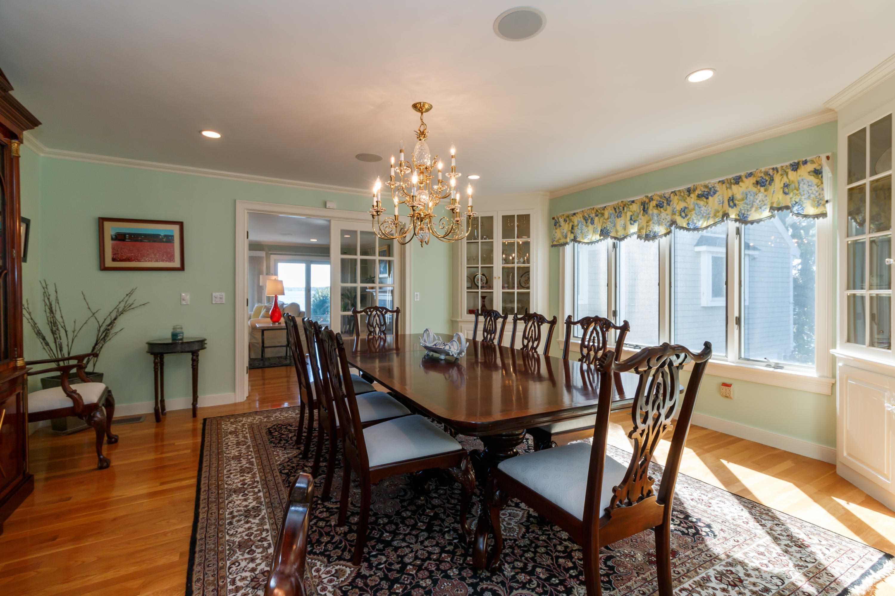 56 Lakeview Drive Centerville, MA 02632 - Photo 14 of 30 a view of a dining room with furniture window and wooden floor