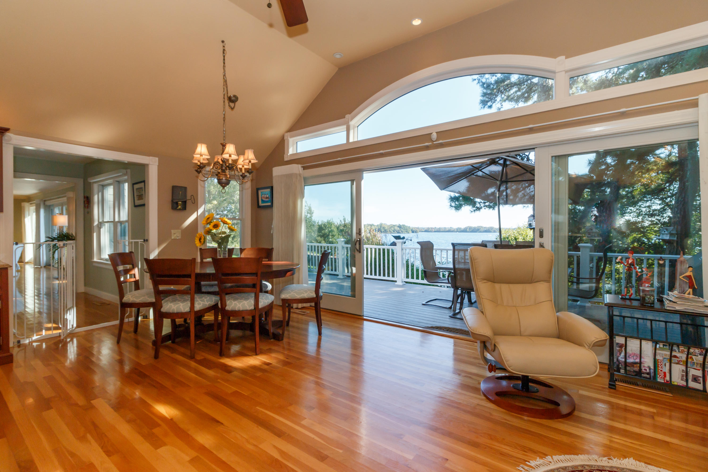 56 Lakeview Drive Centerville, MA 02632 - Photo 16 of 30 a view of a dining room with furniture window and wooden floor