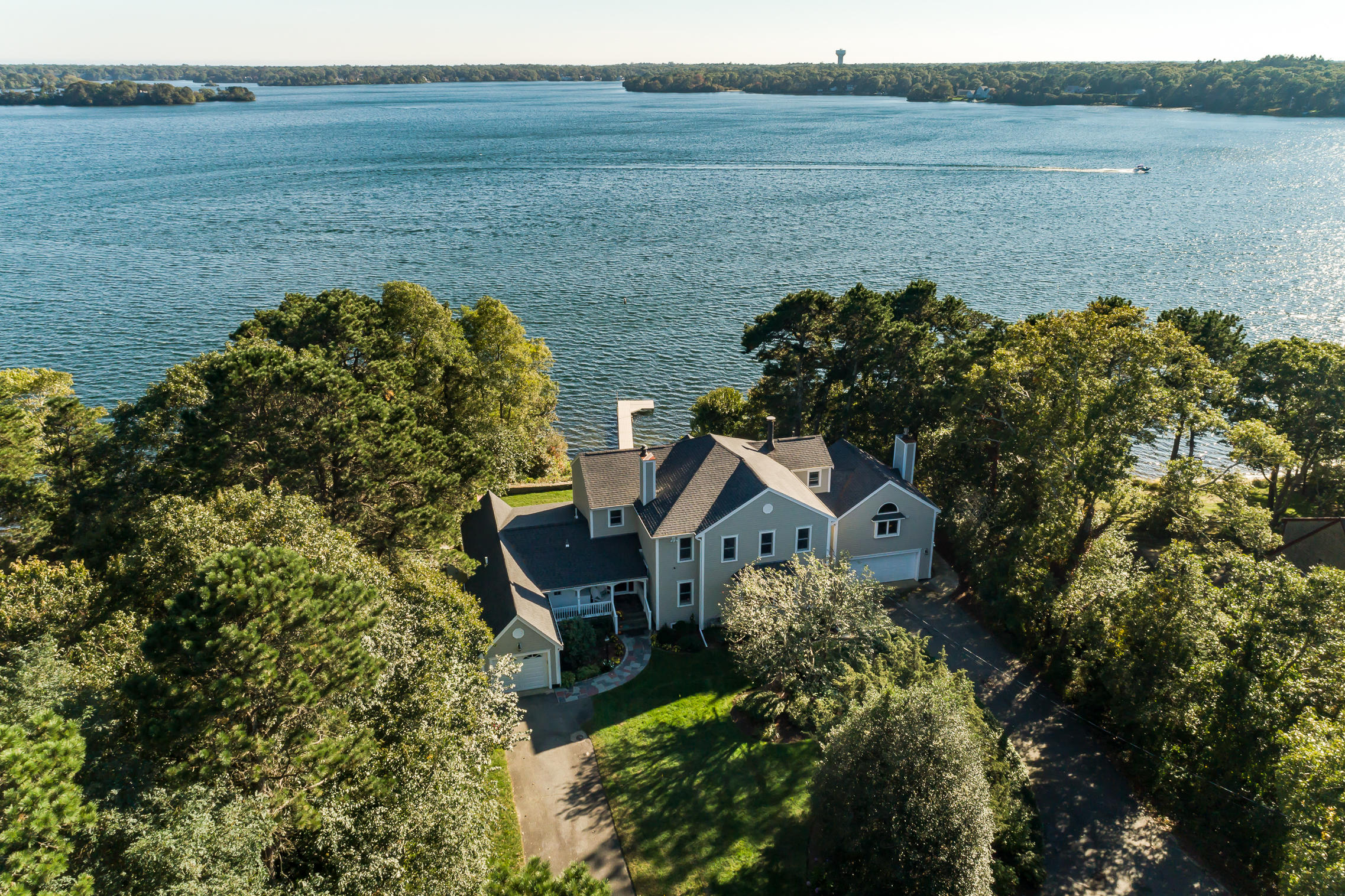 56 Lakeview Drive Centerville, MA 02632 - Photo 2 of 30 a aerial view of a house with a lake view