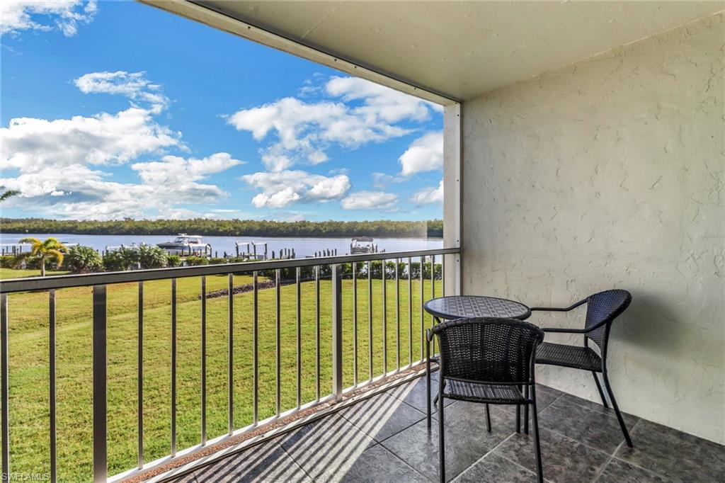 309 Goodlette-Frank Road, Unit A305 Naples, FL 34102 - Photo 8 of 10 Balcony with a water view