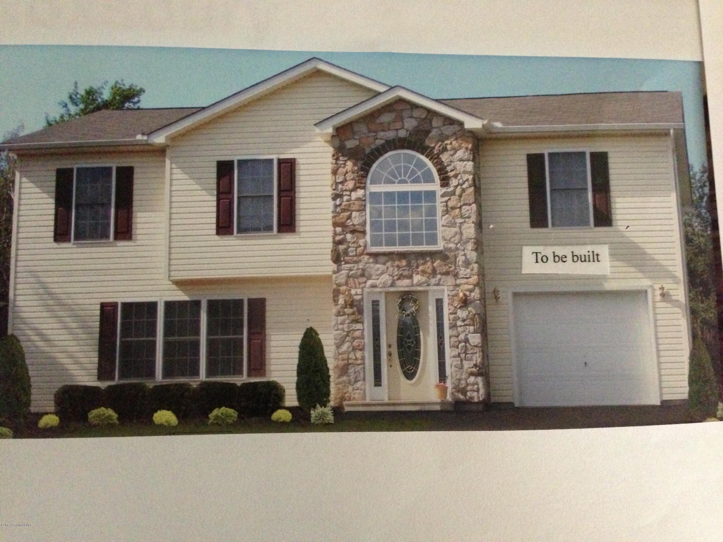 105 Granite Road Long Pond, PA 18334 - Photo 1 of 1 a front view of a house with a yard