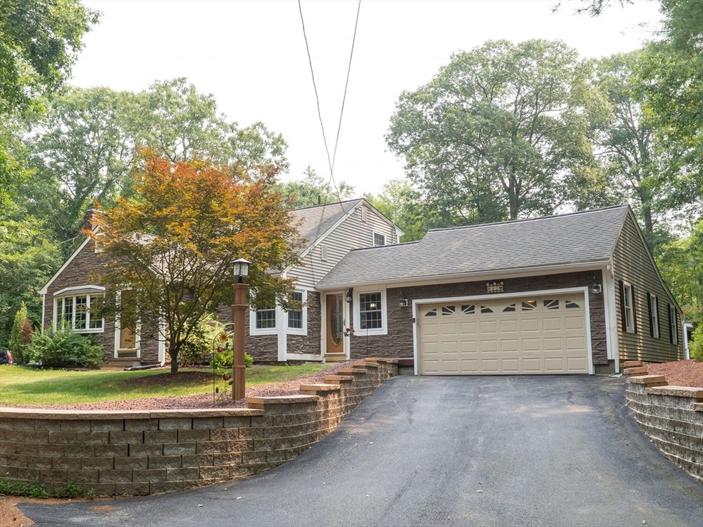 42 Oxbow Road Charlton, MA 01507 - Photo 1 of 42 front view of a house with a yard