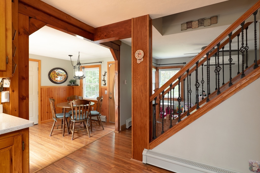 42 Oxbow Road Charlton, MA 01507 - Photo 11 of 42 a view of a hallway with wooden floor and furniture