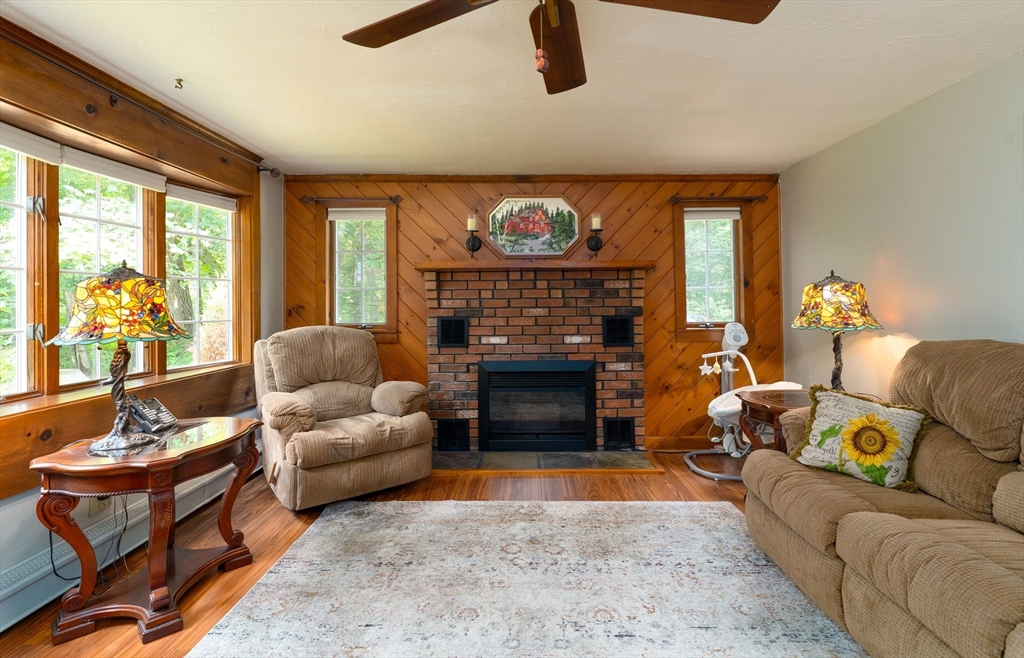 42 Oxbow Road Charlton, MA 01507 - Photo 18 of 42 a living room with furniture a rug and a fireplace