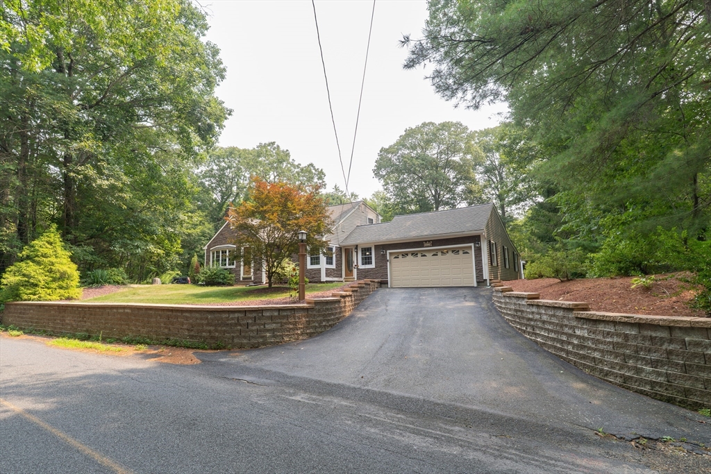 42 Oxbow Road Charlton, MA 01507 - Photo 2 of 42 a front view of a house with a yard and garage