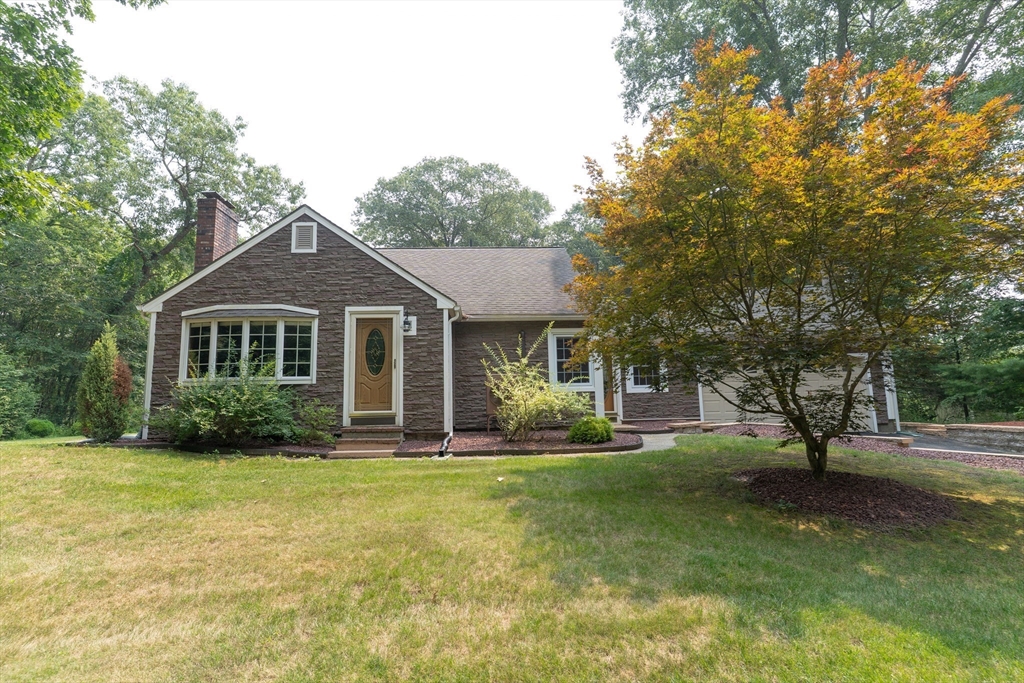 42 Oxbow Road Charlton, MA 01507 - Photo 3 of 42 a front view of a house with a yard