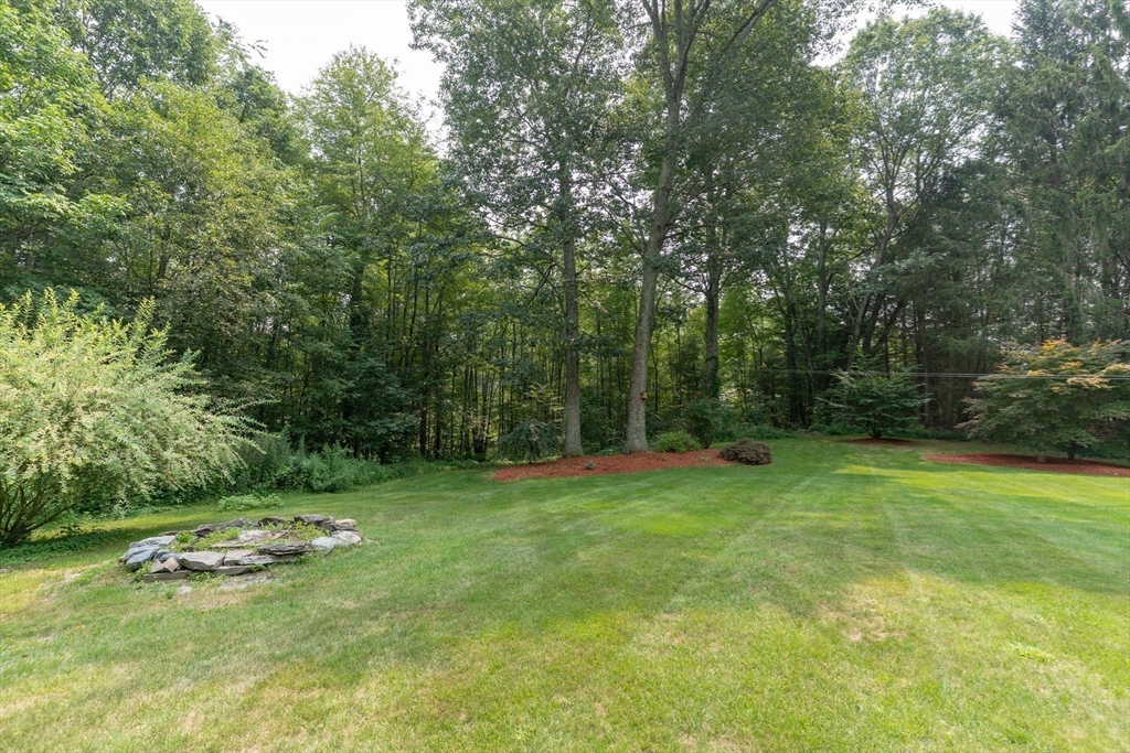 42 Oxbow Road Charlton, MA 01507 - Photo 34 of 42 a view of a swimming pool with a yard