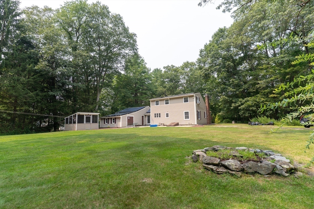42 Oxbow Road Charlton, MA 01507 - Photo 36 of 42 a house with garden in front of it