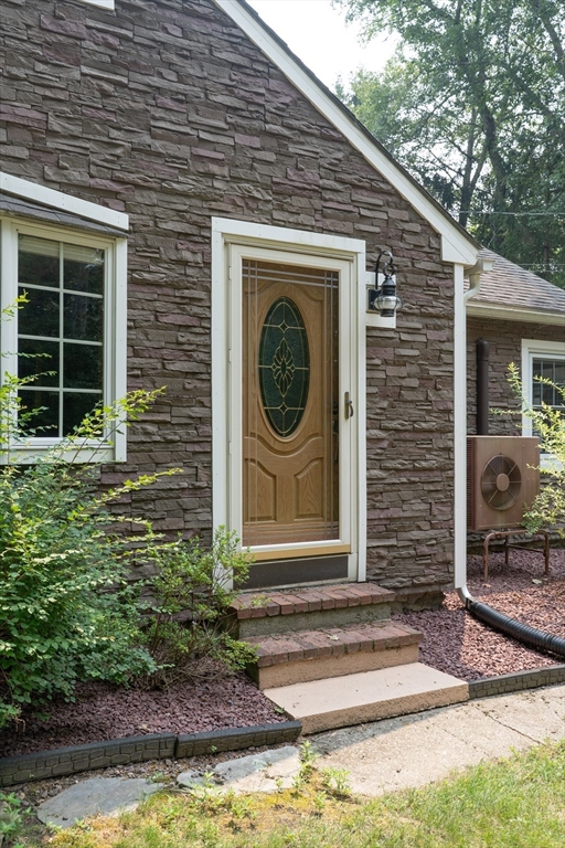 42 Oxbow Road Charlton, MA 01507 - Photo 5 of 42 a front view of a house with garden