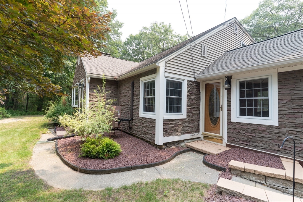 42 Oxbow Road Charlton, MA 01507 - Photo 6 of 42 front view of a house with a yard