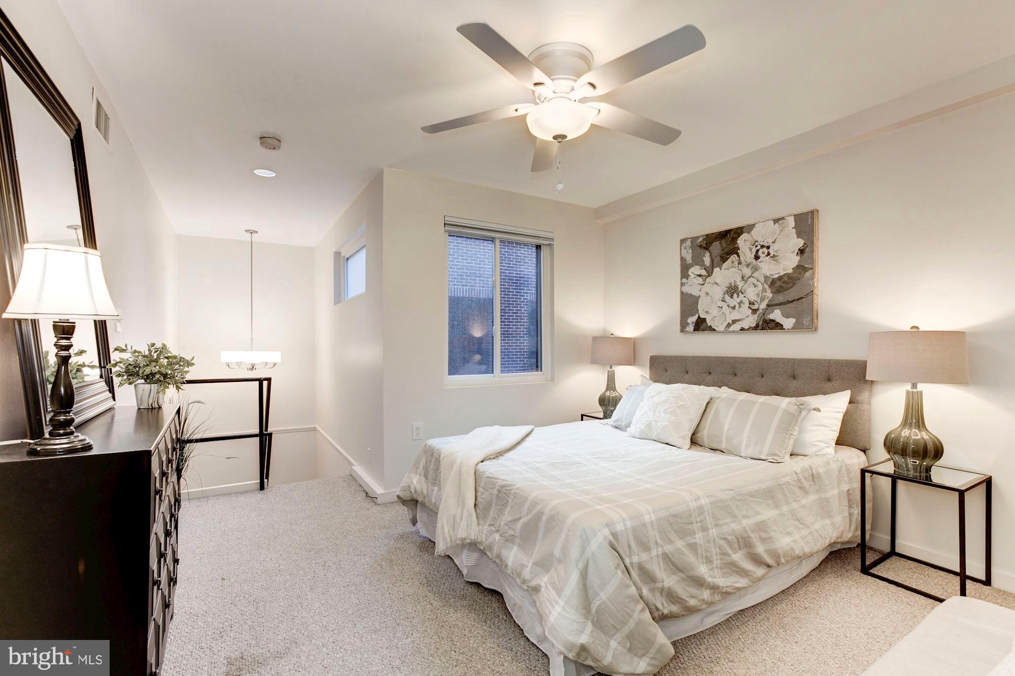 1810 Kalorama Road Northwest, Unit A1 Washington, DC 20009 - Photo 10 of 23 Sunny Upper Level Bedroom with Large Window