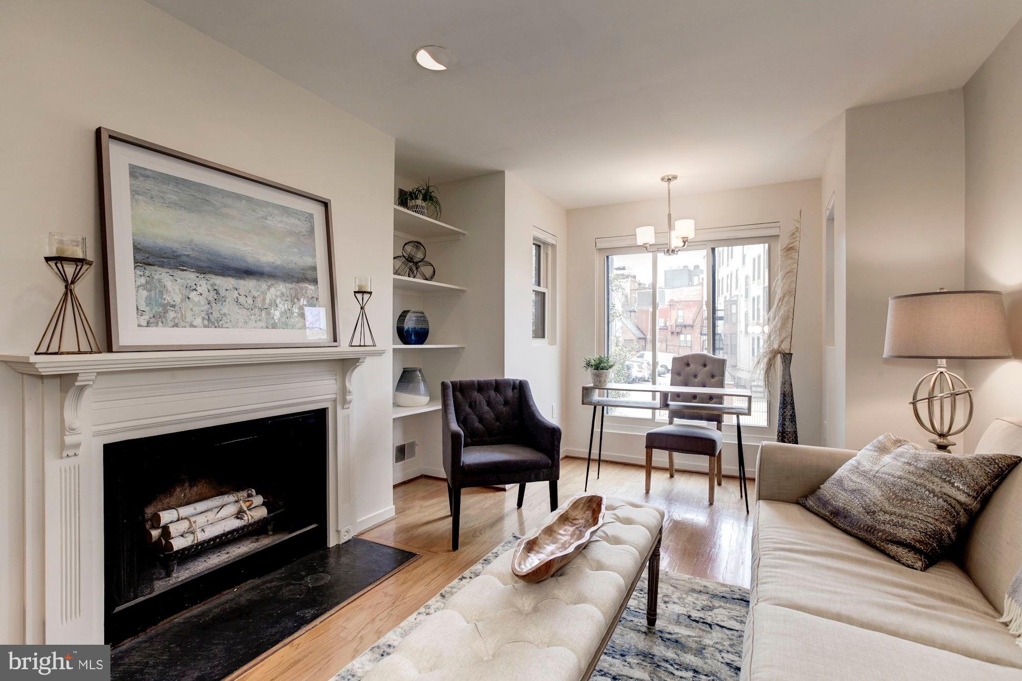 1810 Kalorama Road Northwest, Unit A1 Washington, DC 20009 - Photo 4 of 23 Sun-Lit Living Room w/ Oversized Windows