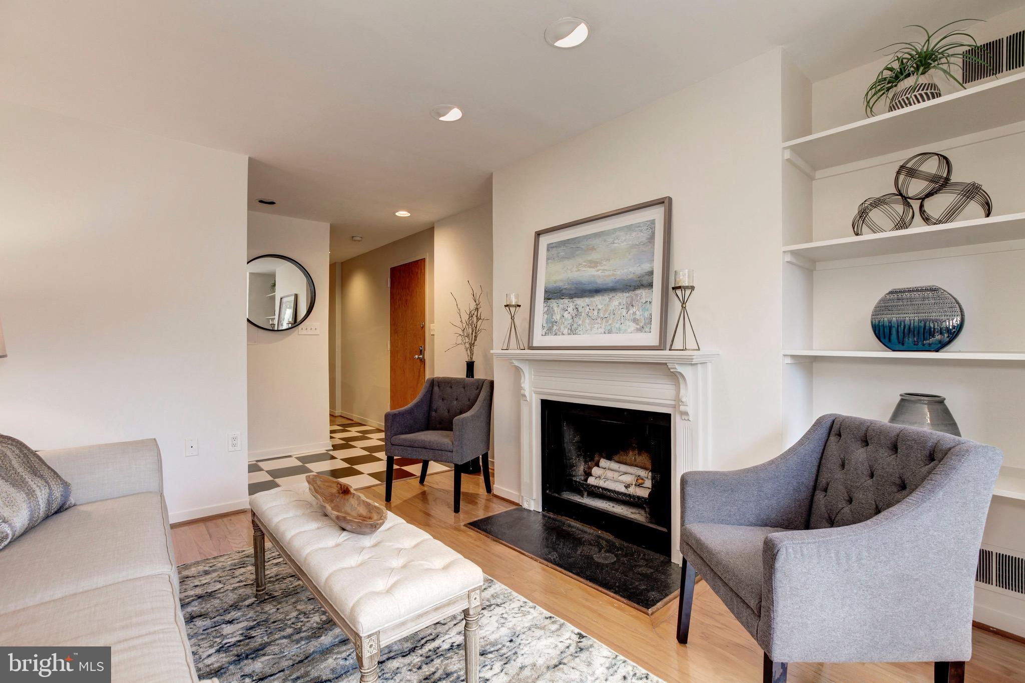 1810 Kalorama Road Northwest, Unit A1 Washington, DC 20009 - Photo 5 of 23 Lovely Fireplace with Wood Mantle and Built-Ins