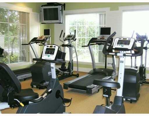 157 Yacht Club Way, Unit 201 CORNER Hypoluxo, FL 33462 - Photo 23 of 24 a view of a workspace with furniture and a window