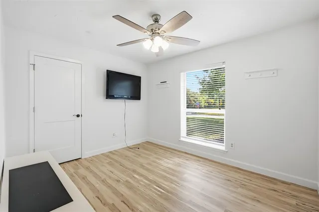 a view of a livingroom with a flat screen tv