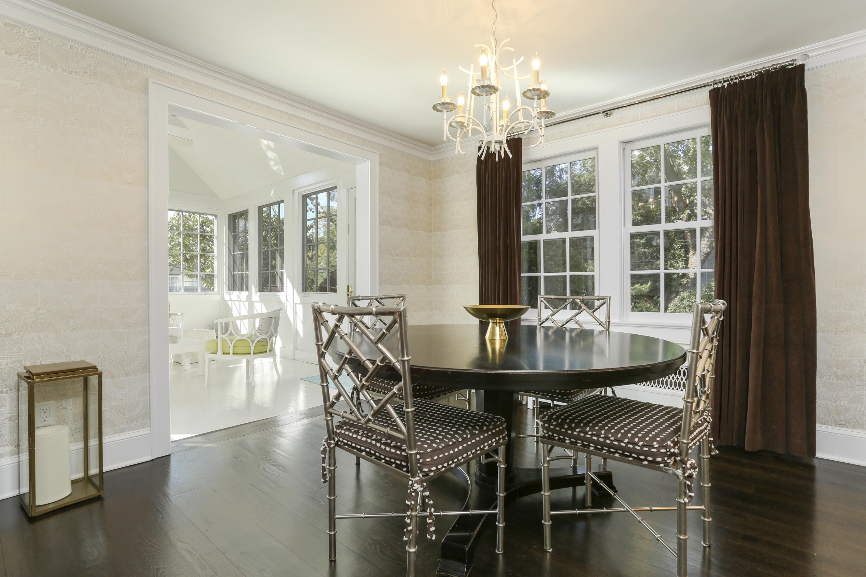 7 Bryan Road Norwalk, CT 06853 - Photo 11 of 37 a dining room with furniture a chandelier and wooden floor