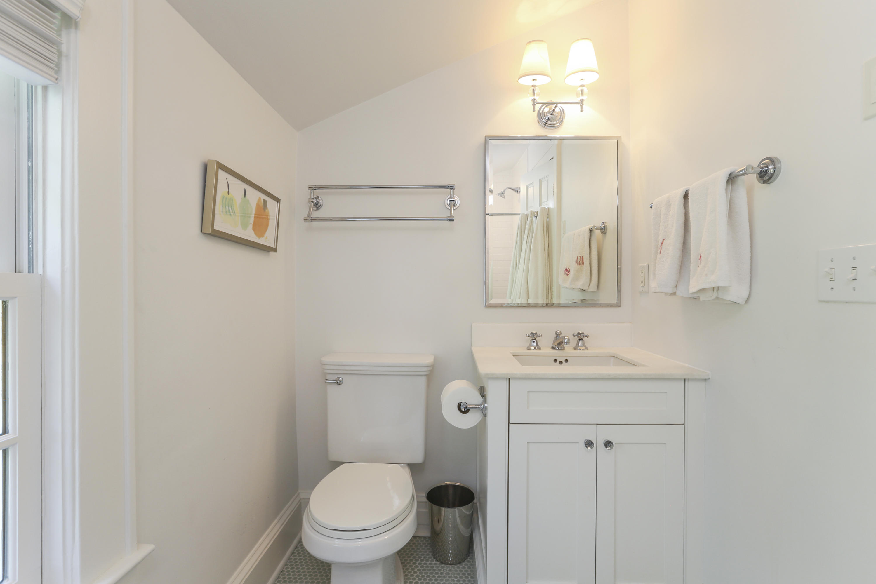 7 Bryan Road Norwalk, CT 06853 - Photo 30 of 37 a bathroom with a toilet sink and mirror