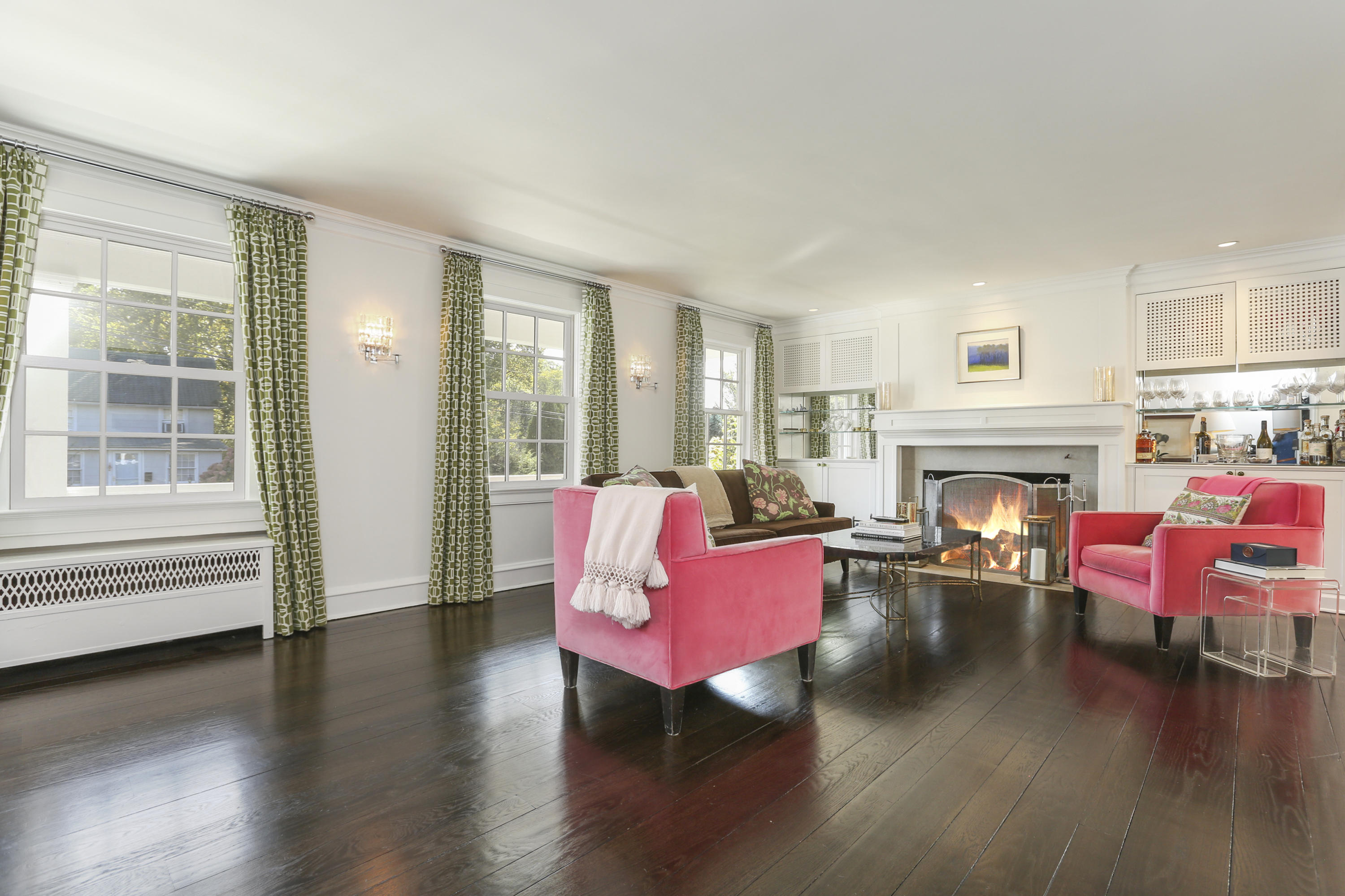 7 Bryan Road Norwalk, CT 06853 - Photo 8 of 37 a living room with furniture wooden floor and a fireplace