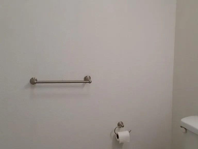 304 Fulton Street, Unit B Denton, TX 76201 - Photo 7 of 10 Half bathroom featuring toilet