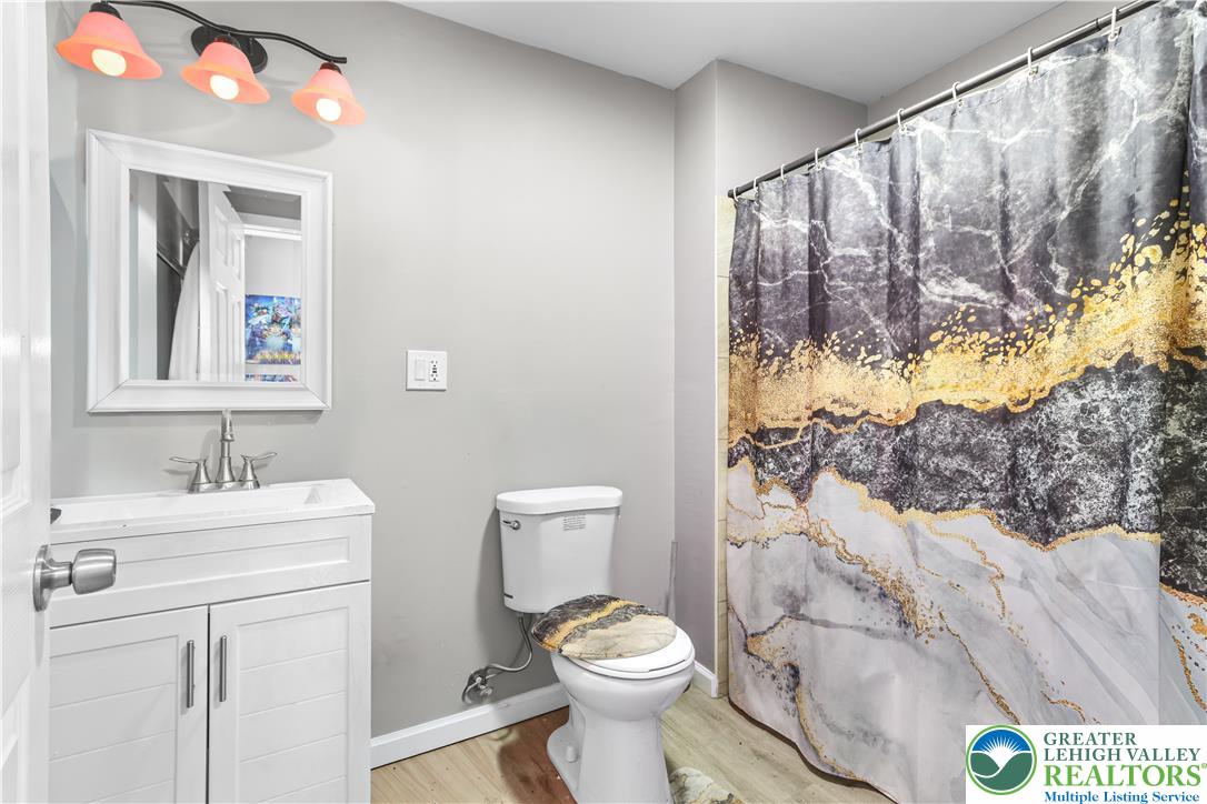 12 South Front Street Coplay, PA 18037 - Photo 11 of 41 This updated bathroom offers practical design and a bright, functional space.