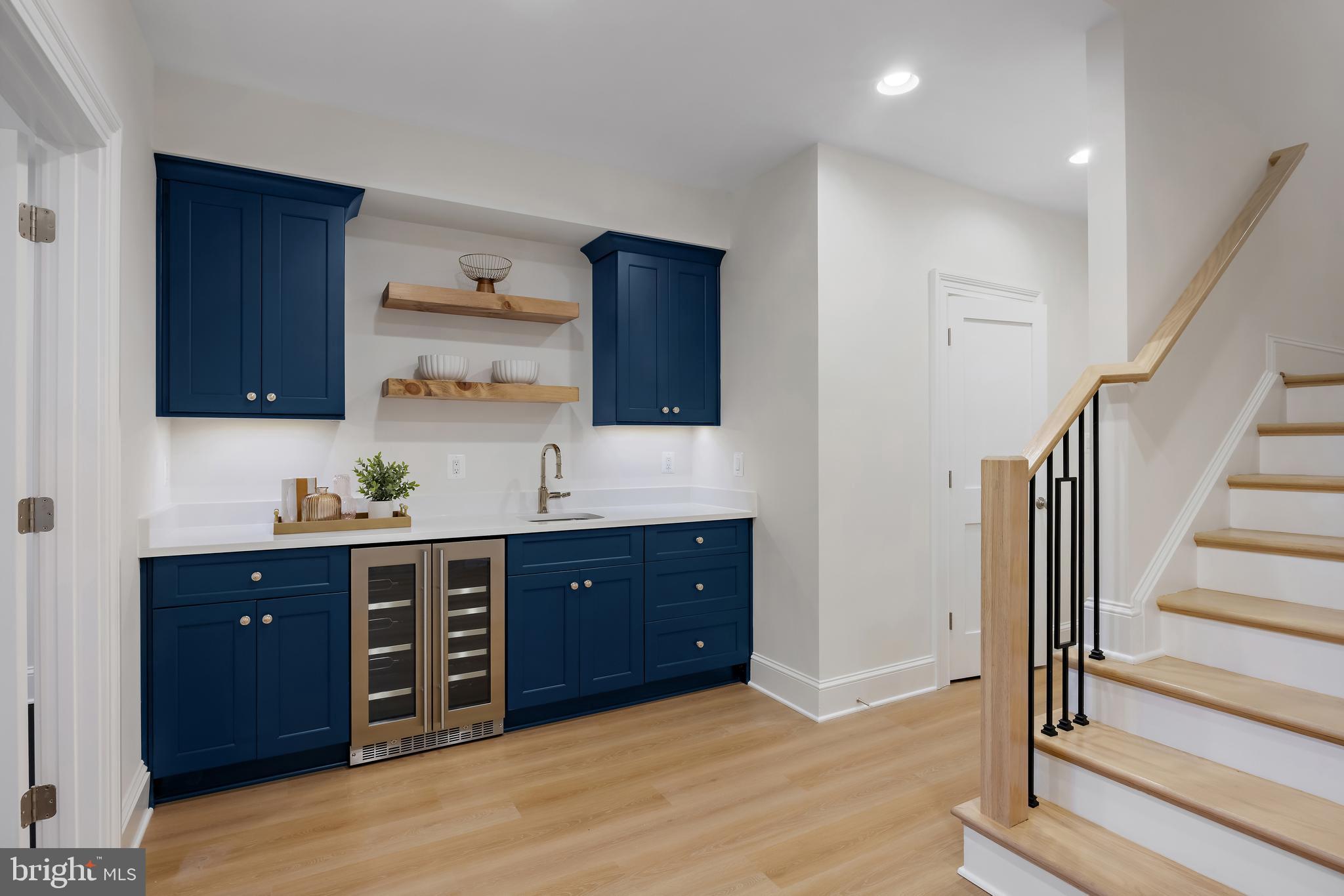 8628 Plymouth Road Alexandria, VA 22308 - Photo 44 of 50 a view of kitchen with wooden floor and cabinets