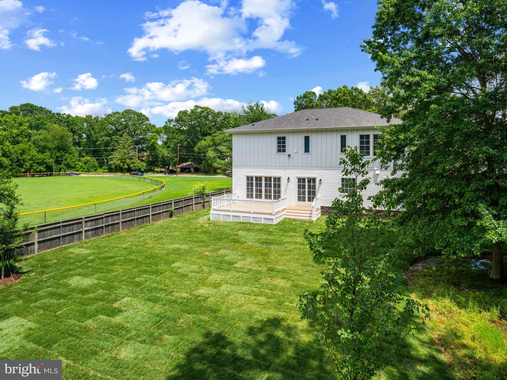 8628 Plymouth Road Alexandria, VA 22308 - Photo 50 of 50 a front view of a house with a yard