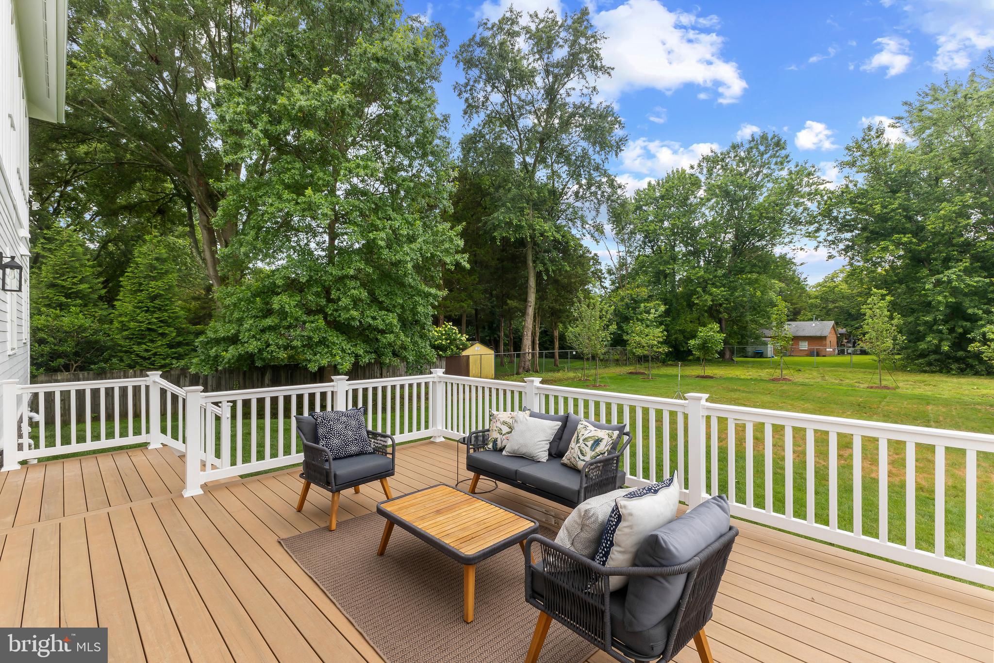 8628 Plymouth Road Alexandria, VA 22308 - Photo 8 of 50 a view of a two chairs on the deck