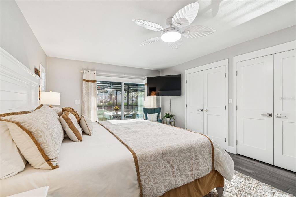 5809 Rio Drive New Port Richey, FL 34652 - Photo 16 of 61 a bedroom with a bed and a large window