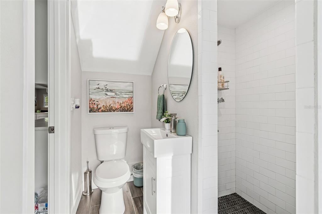 5809 Rio Drive New Port Richey, FL 34652 - Photo 20 of 61 a white toilet sitting next to a bathroom sink