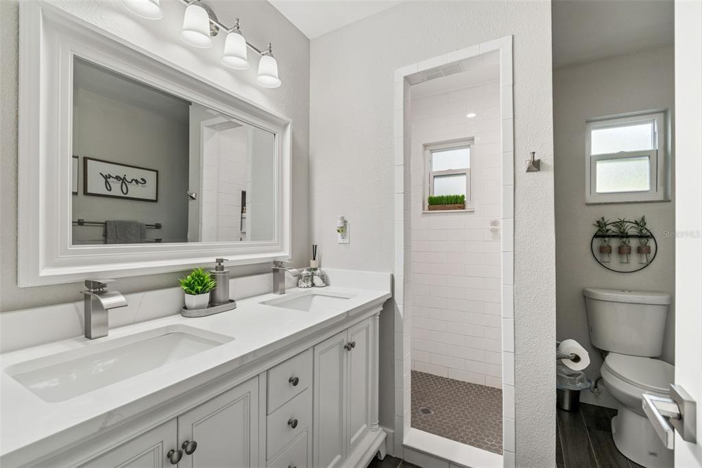 5809 Rio Drive New Port Richey, FL 34652 - Photo 28 of 61 a bathroom with a sink and a mirror