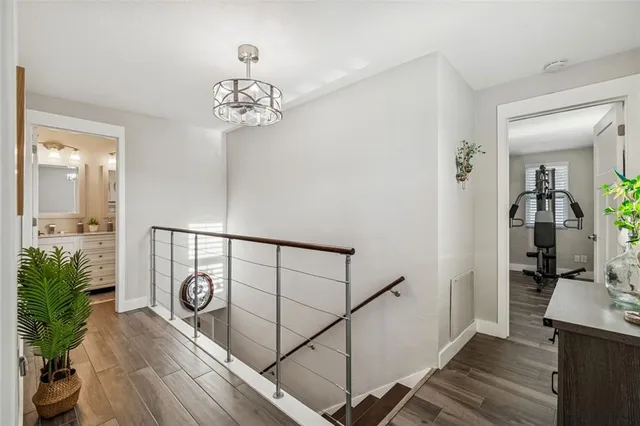 a view of a lake with chairs